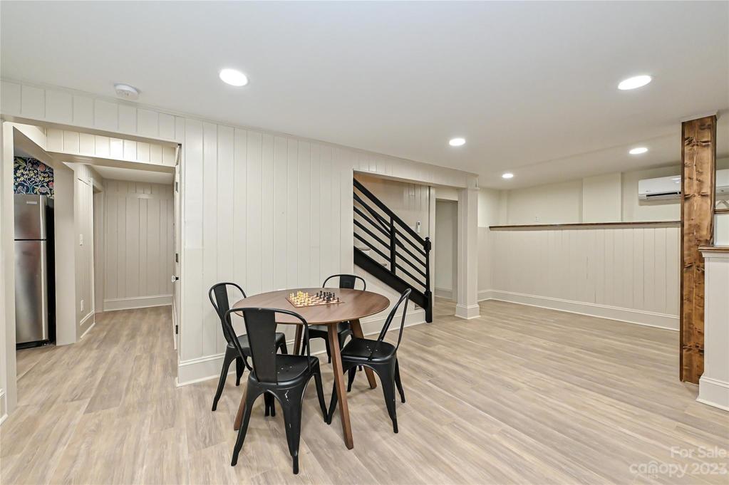 Head downstairs for MORE house which includes this perfect dining area for breakfast or game night!