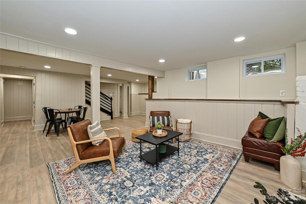 Behind staircase is another HUGE room perfect for home office, home gym, playroom, etc!