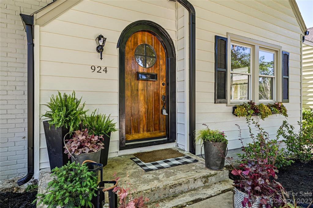 Beautiful antique arched doorway leads to fully renovated historic home