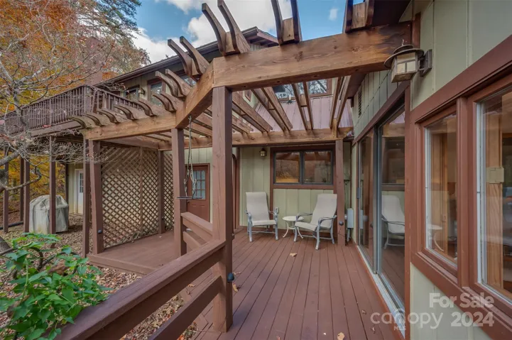 One more outdoor gathering space. Access from the sunroom on the right. Door on the left leads to the garage.