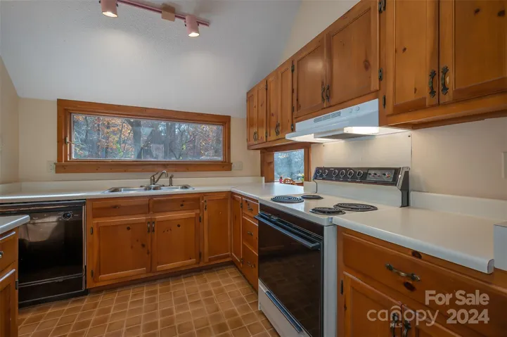 Kitchen with pass through to dining area.