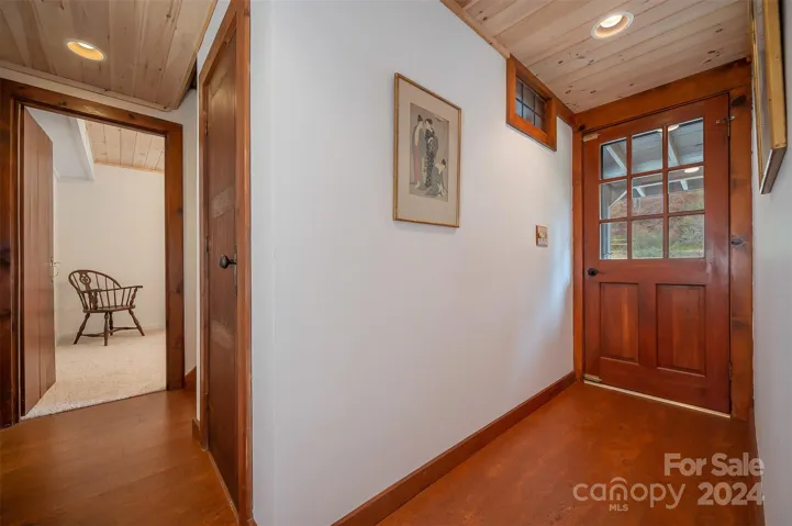 Foyer w/ office entrance to the left.