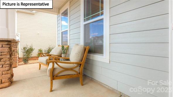 Covered Front Porch with Stoen Accents
