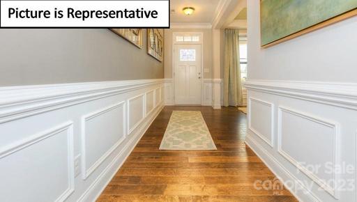 Foyer with detailed trim.