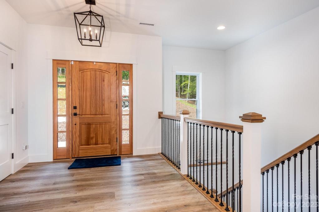 Entry way with staircase to basement