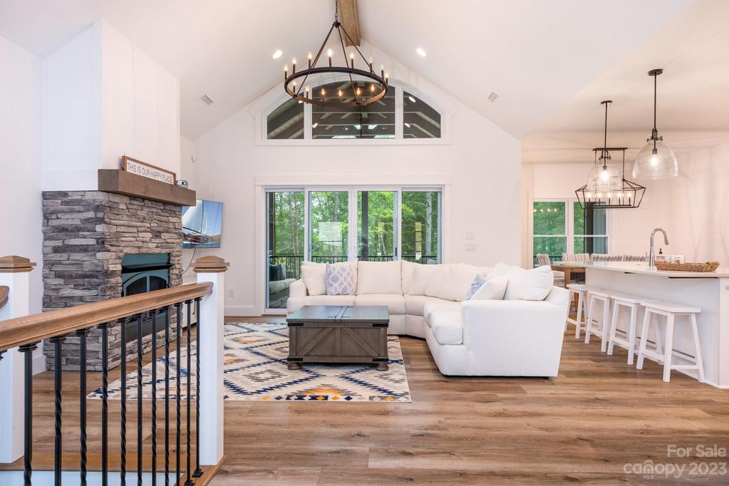 Living room with sliding doors leading to screen porch