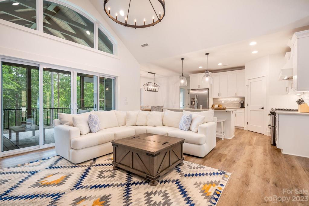 Living room open to kitchen and dining area