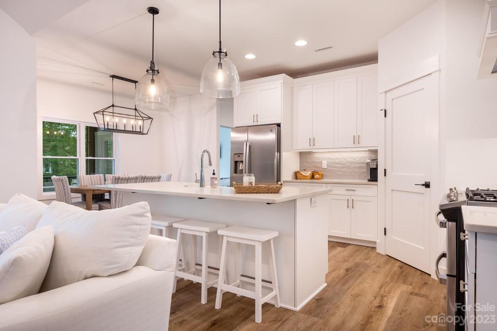 Kitchen with island breakfast bar