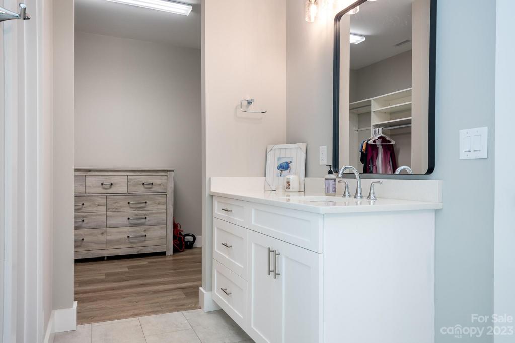 Primary bathroom with 2 vanities