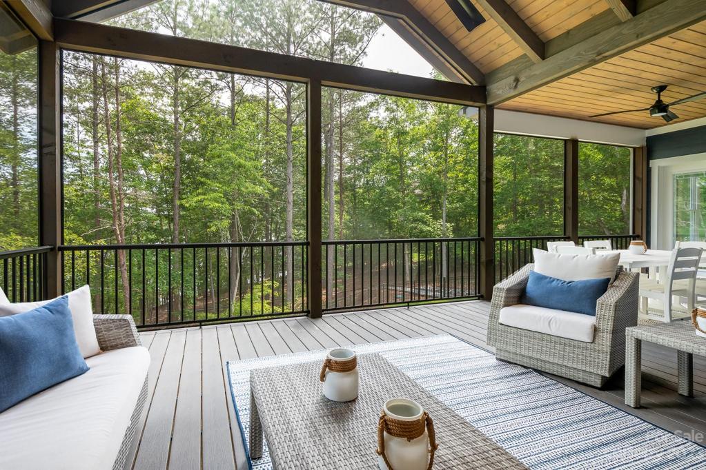 Screened porch sitting area
