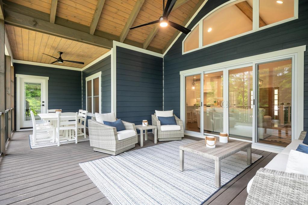 Screened porch with sitting and dining area