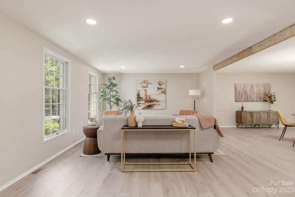 Large family room as you enter house that flows into dining room