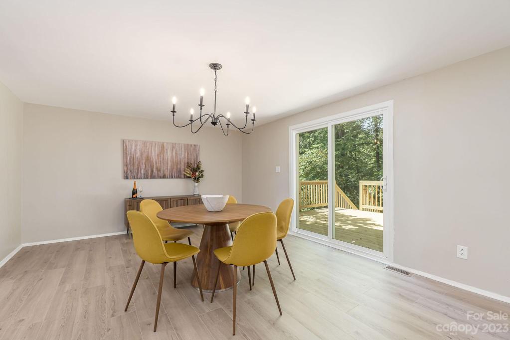Open floor plan - dining room connected to kitchen and family room