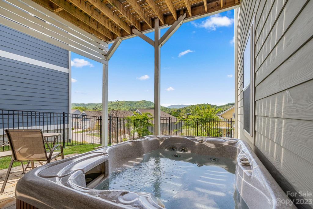 Relax in your hot tub spa and take in your mountain view.