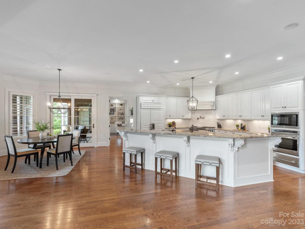 This kitchen is wide open with panoramic golf course views!