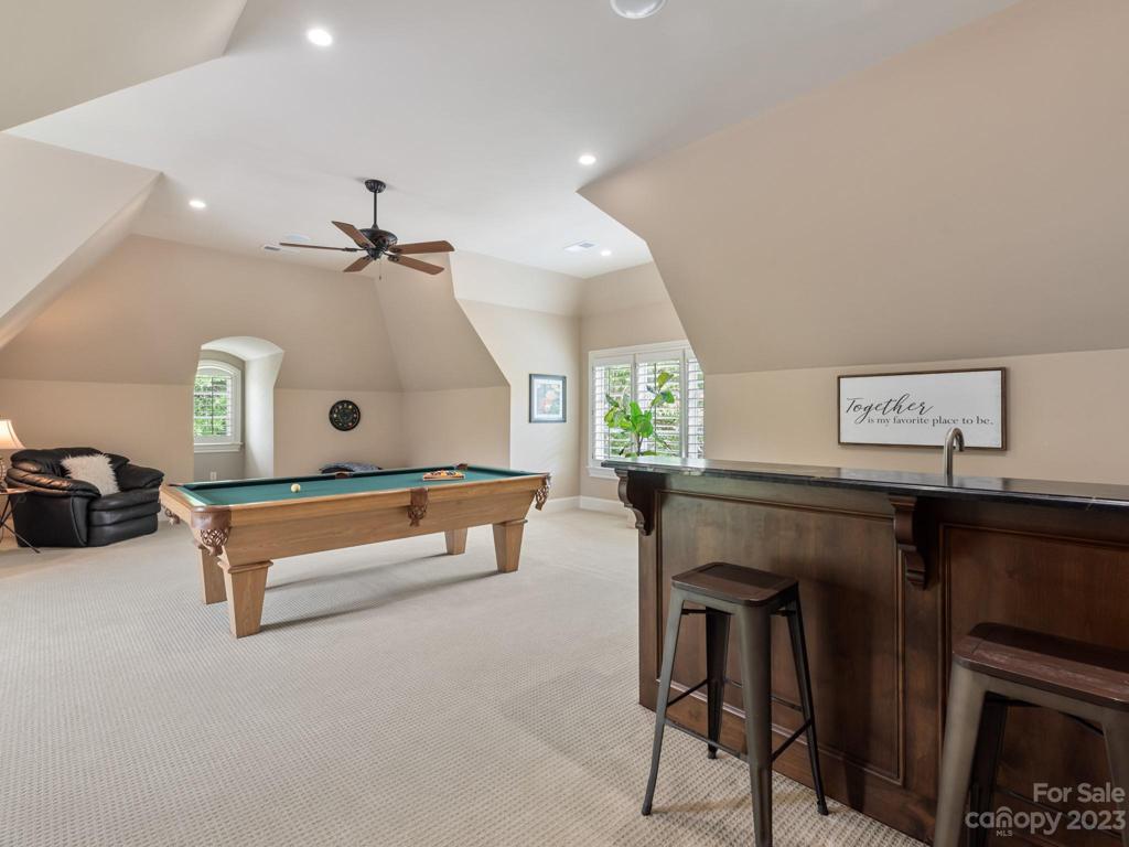 2nd floor Rec room with lots of natural light, juliet balcony and wet bar with beverage center!