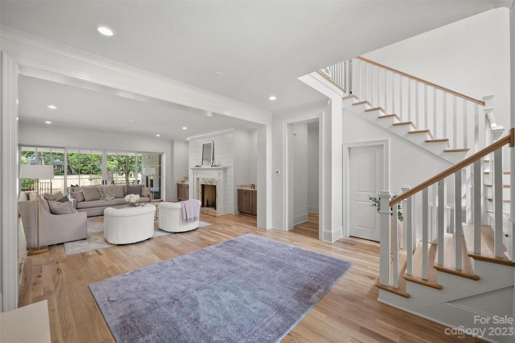 With 10-foot ceilings, pristine site-finished wide-plank hardwoods, and impeccable custom millwork throughout, this dwelling is a testament to high quality craftsmanship.