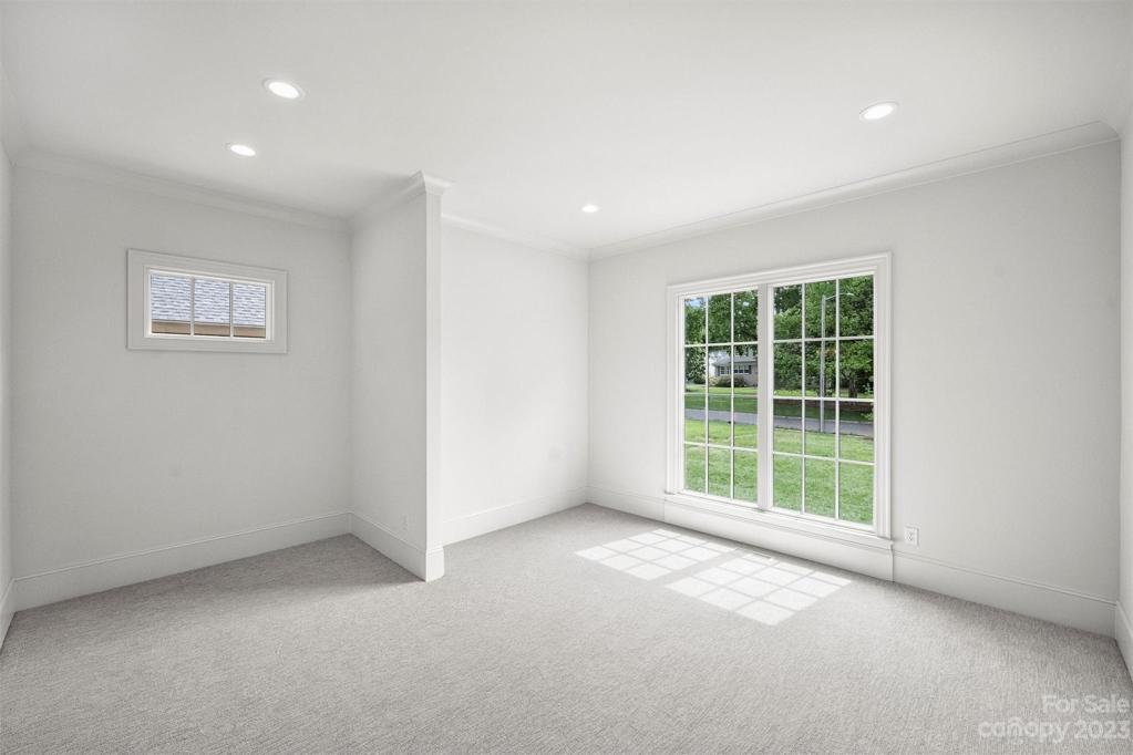 Revel in the abundance of space provided by the expansive walk-in closet. Builder offering allowance toward custom closet system of buyer's choice.\