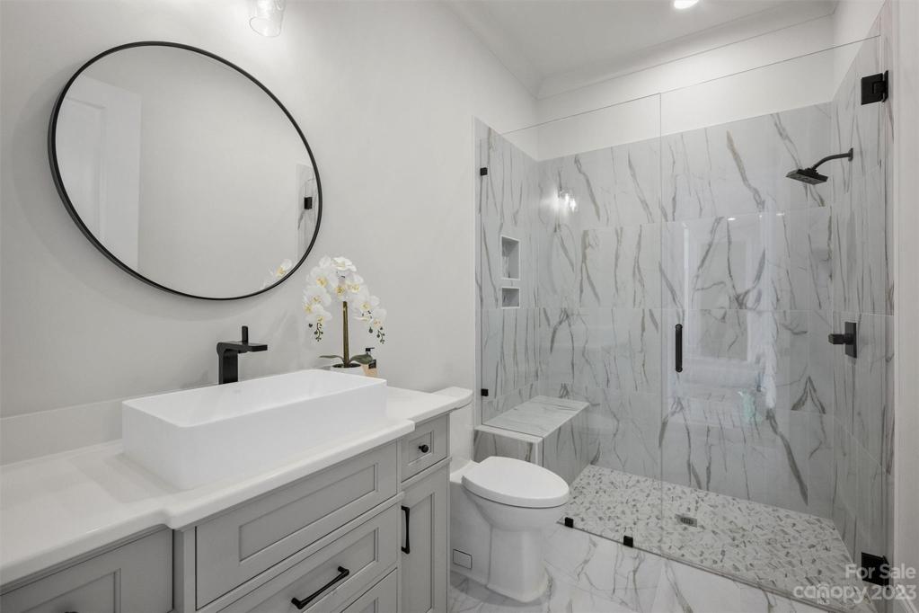 Secondary full bath on main level.