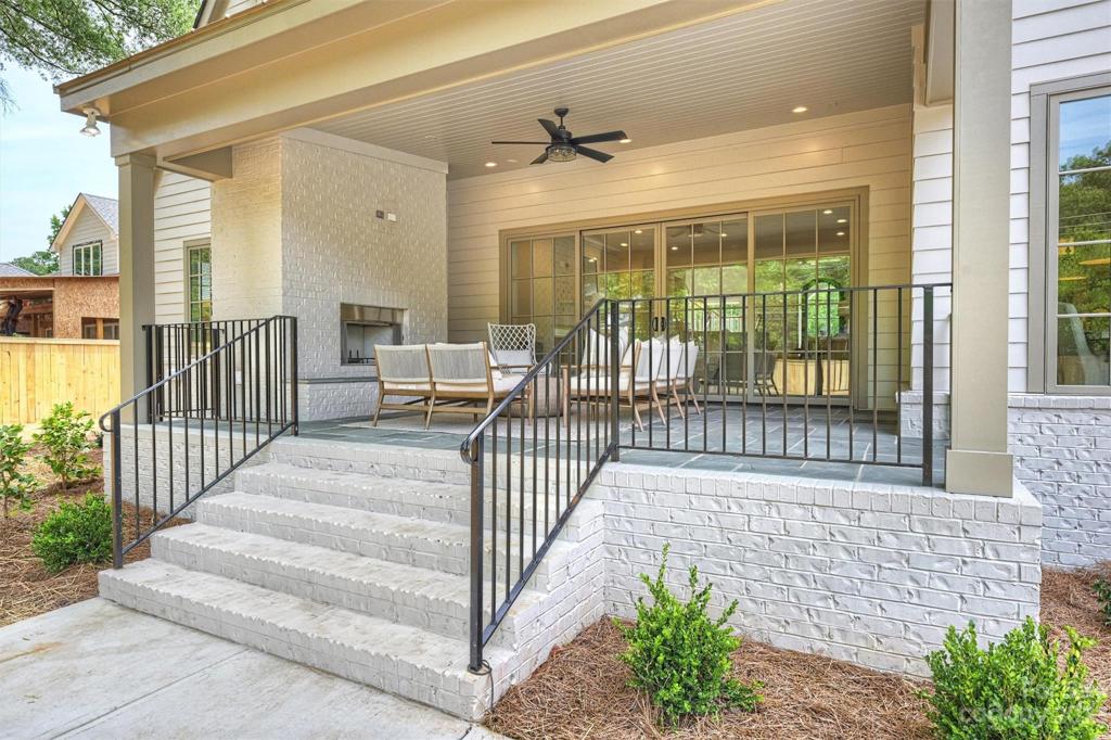 Adorned with Bluestone tile and a charming, wood-burning, brick fireplace, this outdoor oasis is the epitome of luxurious entertainment.