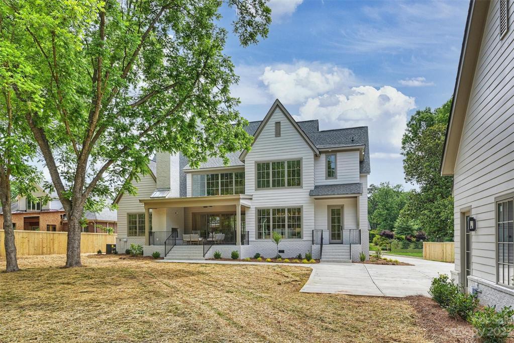 The fenced backyard sits on an expansive, flat, .55-acre lot that is simply ideal for the addition of a resort-style pool.