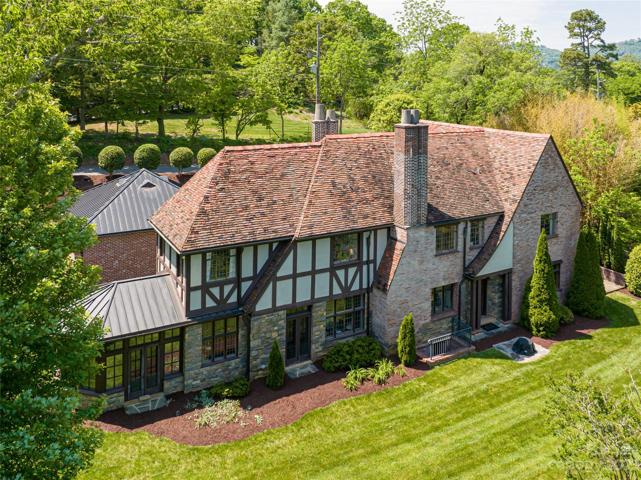 The beautiful Ludowici Terra Cotta Clay roof is a Work of Art in and of itself. All of the original tiles were removed, inspected, replaced as needed with the same Ludowici color palette tiles as the originals!