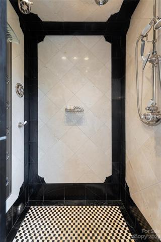 ...with a steam shower enhanced with Herbeau shower faucets
