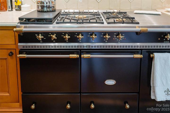 Speaking of flawless - along with being the best of the best...your world renowned Lacanche French Range (a gas range, 1 electric oven and 1 gas oven, as well as a warming cabinet)