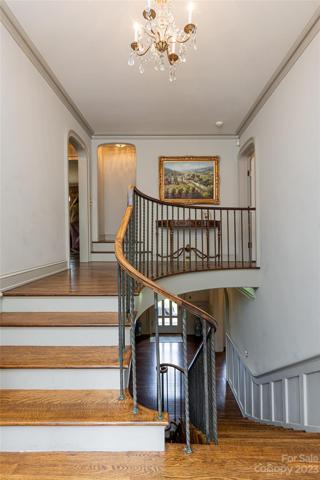 Time to enter that arched doorway straight ahead with steps leading to the previous attic space