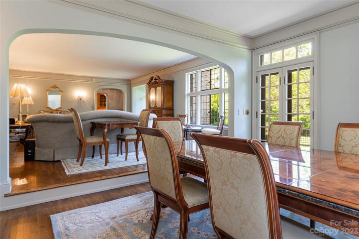 Should you elect, through those French doors with the clerestory windows, you may access al fresco living and dining on the front lawn