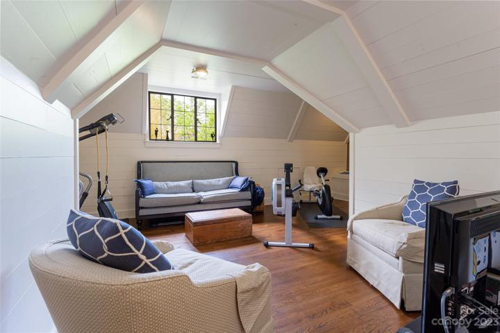 A completely finished attic with hardwood floors, buttboard walls, multiple bonus areas (office? yoga studio? artist's atelier?), a cedar closet, several additional storage areas (with unlimited possibilities) and...