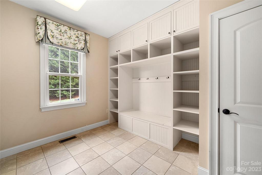 Custom shelving in laundry room