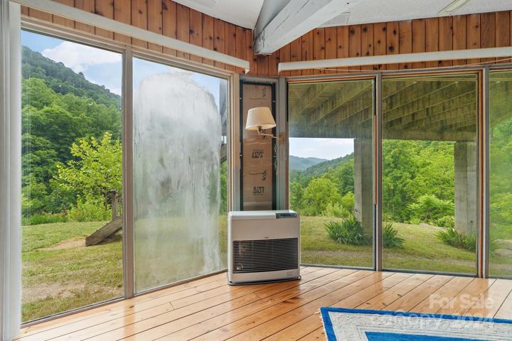 Notice large windows to enjoy the view. Monitor kerosene heating