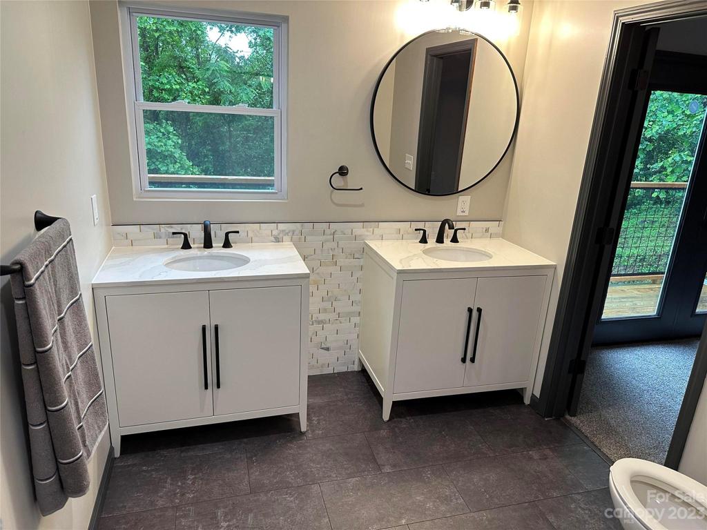 upper primary bathroom double vanities.
