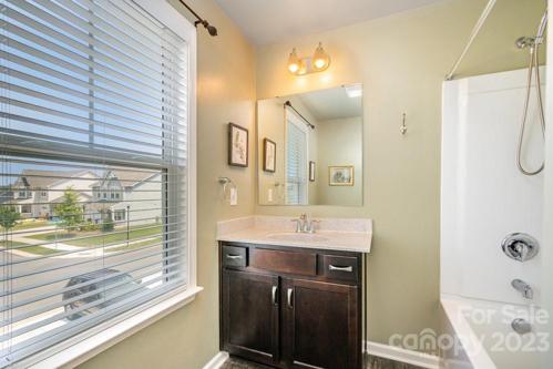 Bathroom#2. Connects to bedroom #2 and has a separate door to the hallway, Second level