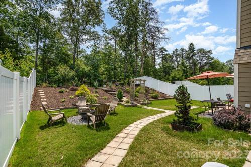 View of backyard from fence gate