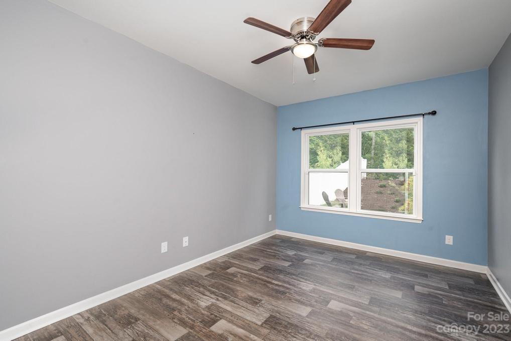 Spacious office on the first floor next to the powder room with plenty of natural light