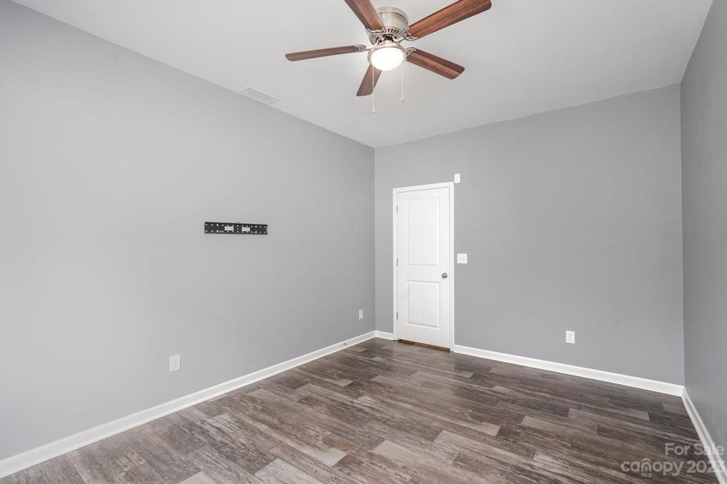 Spacious office on the first floor next to the powder room with plenty of natural light