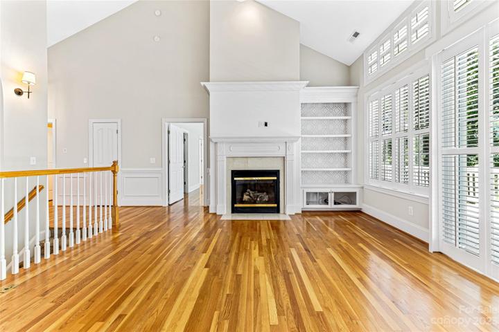 Living area with a fire at the flip of a switch.
