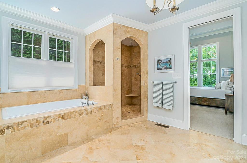 Tiled Shower plus oversized soaking tub in Primary Bath