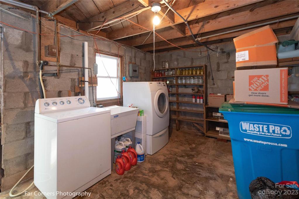 Laundry room, in storage building off carport