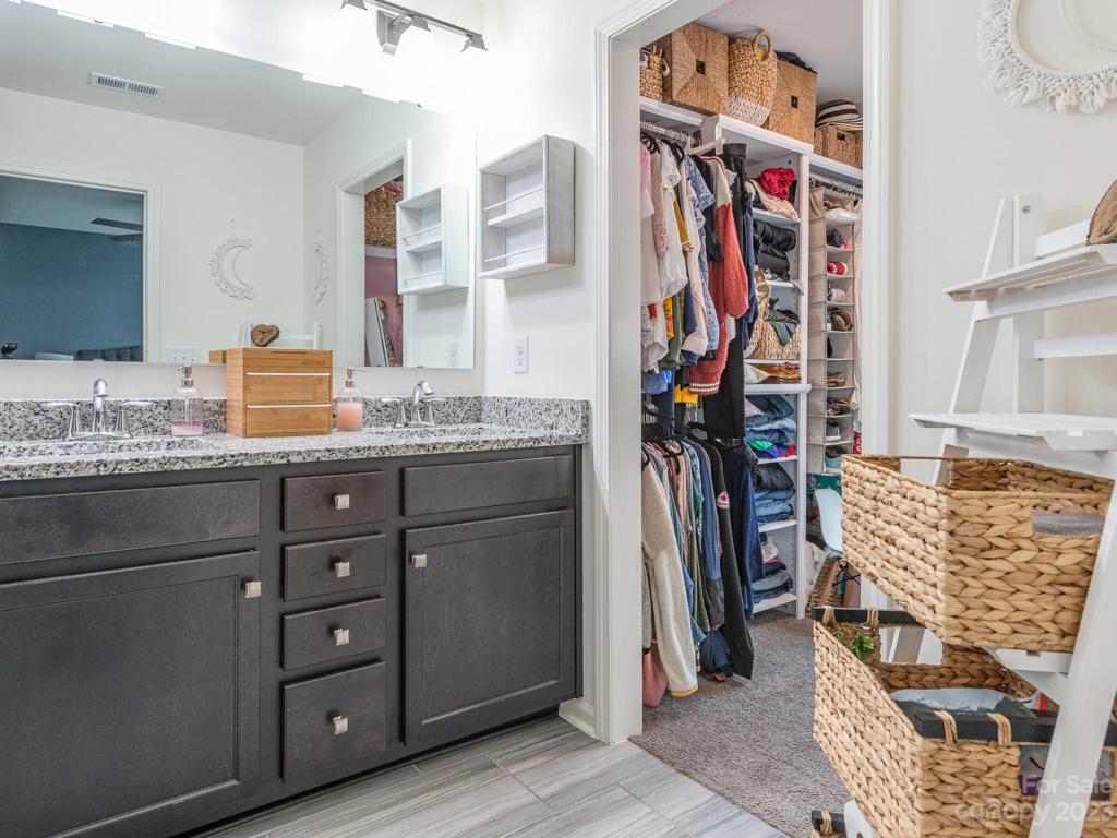 Primary Bathroom into Walk-in closet
