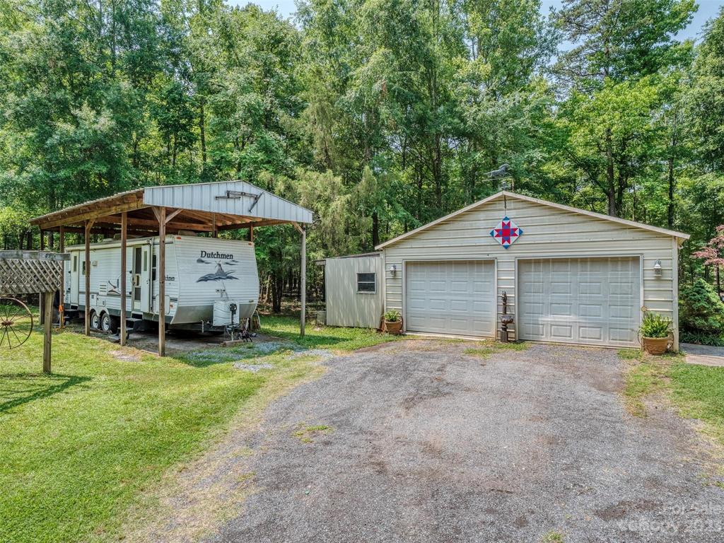 Huge 2 car garage and RV carport