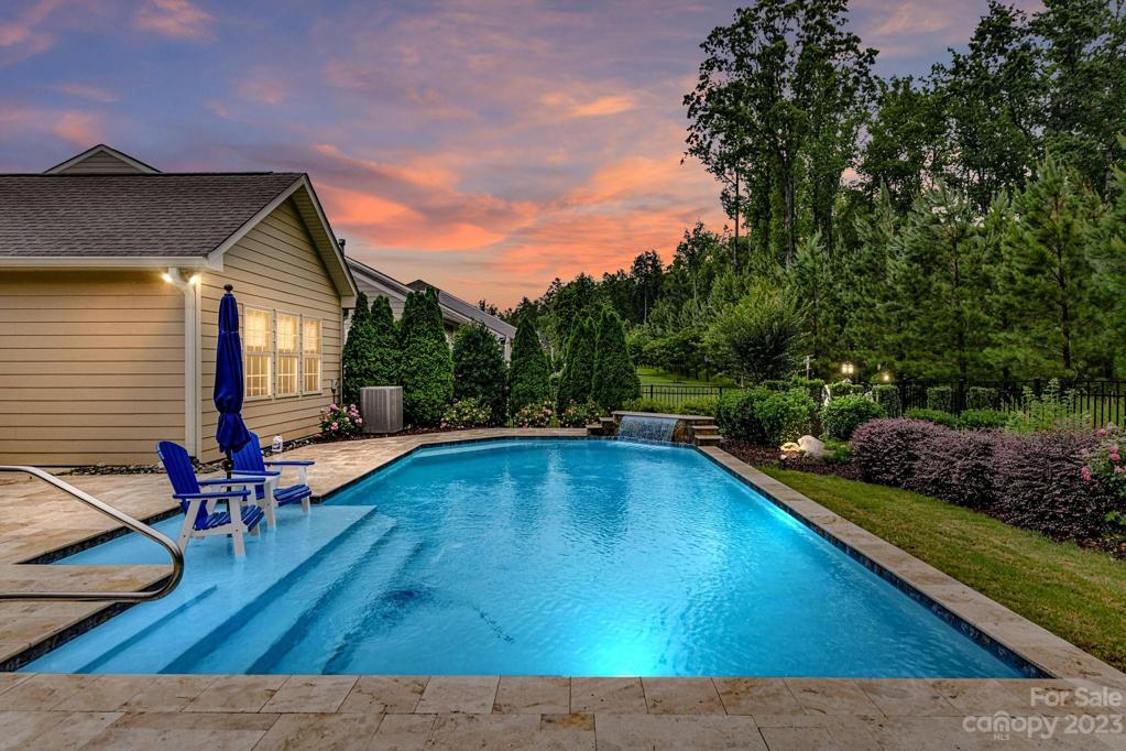 This Home Backs to Trees and Common Area. Lush Landscaping and Fenced Yard