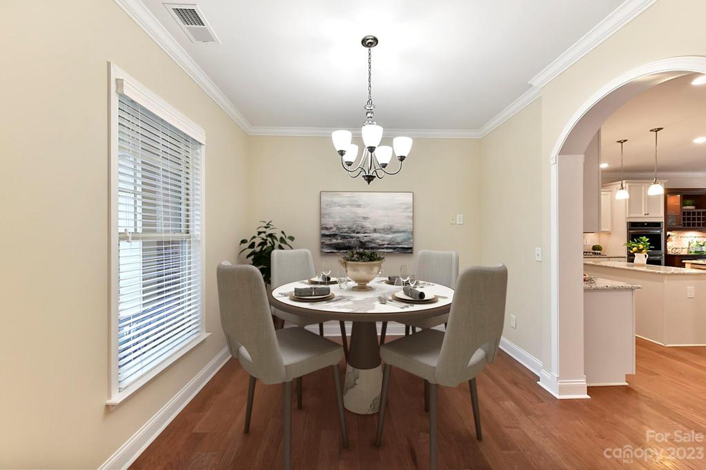 "Virtual" Staging of Breakfast Room. Arched Entry to Kitchen yet Private Location