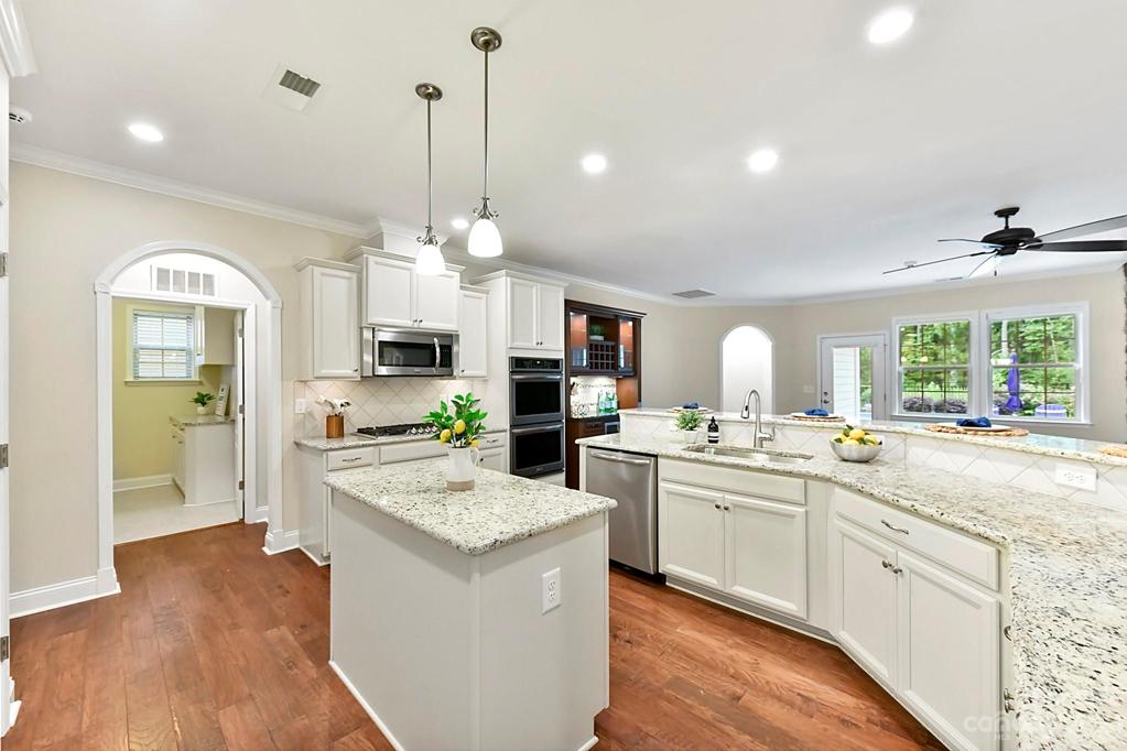 Double Wall Convection Ovens and Gas Range. Granite Counters and Under Counter Lighting
