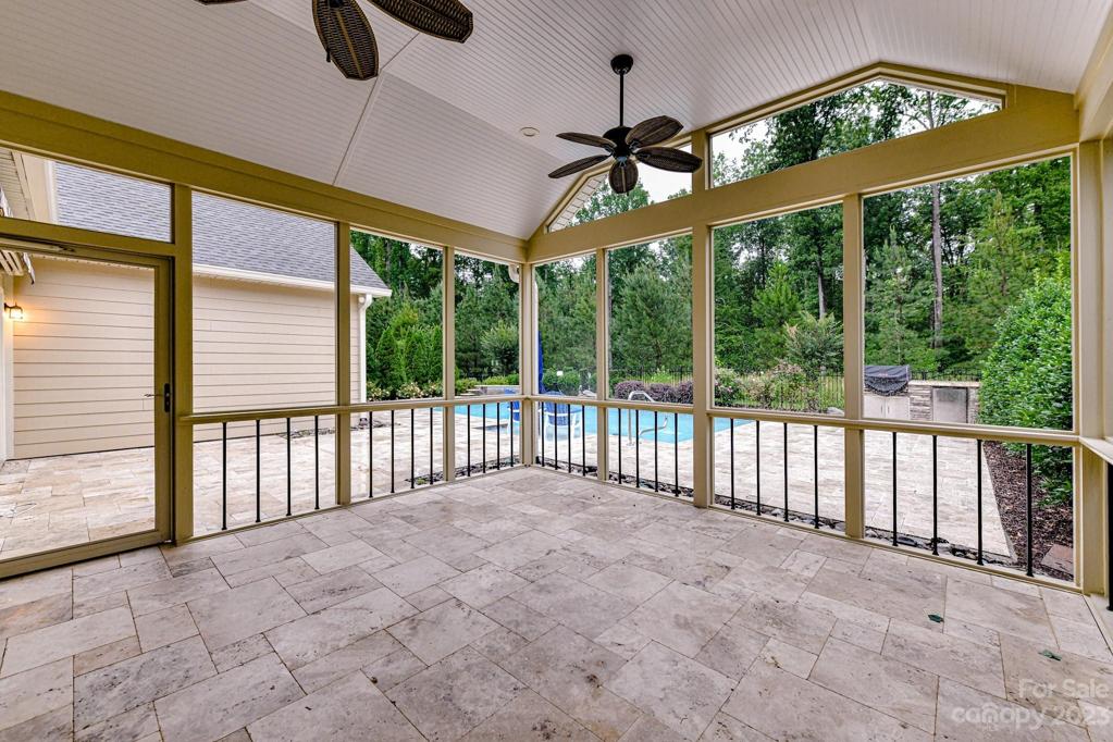 Large Custom Screened Porch with 2 Fans, Bead Board Ceiling and Travertine Flooring