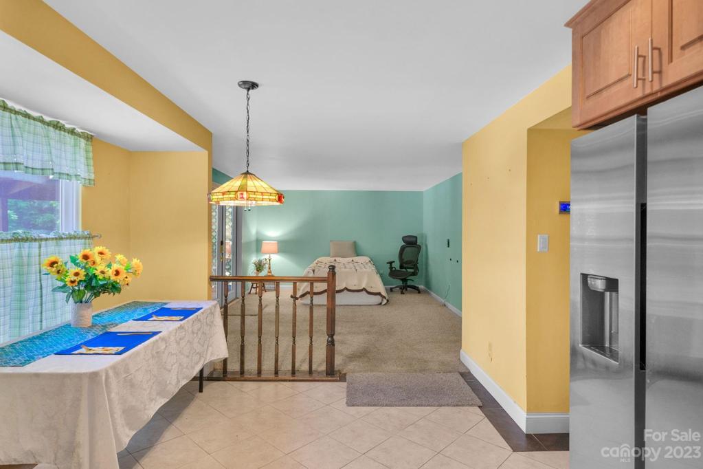 Breakfast nook (7'x6') view of family room. (bed is temporary)