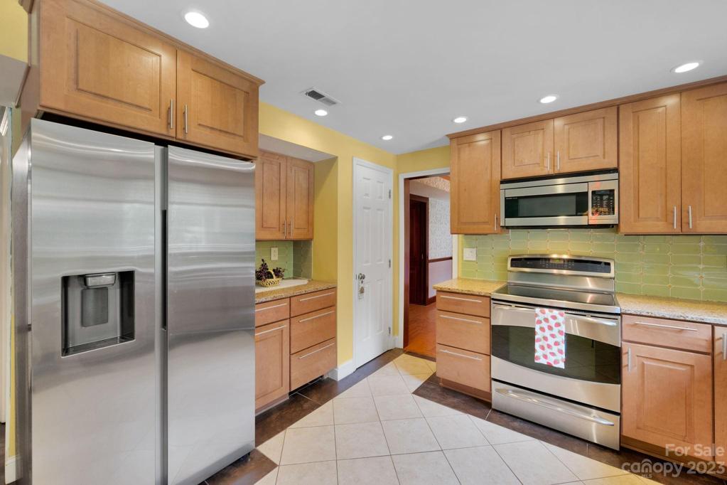 New Samsung refrigerator is included. Notice the ceramic tile flooring