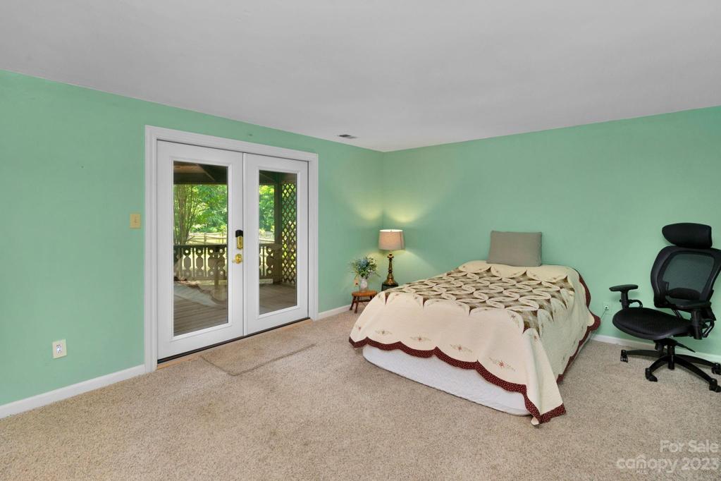 Family room 17'10"x12'8" with Andersen French Doors leading to screened porch